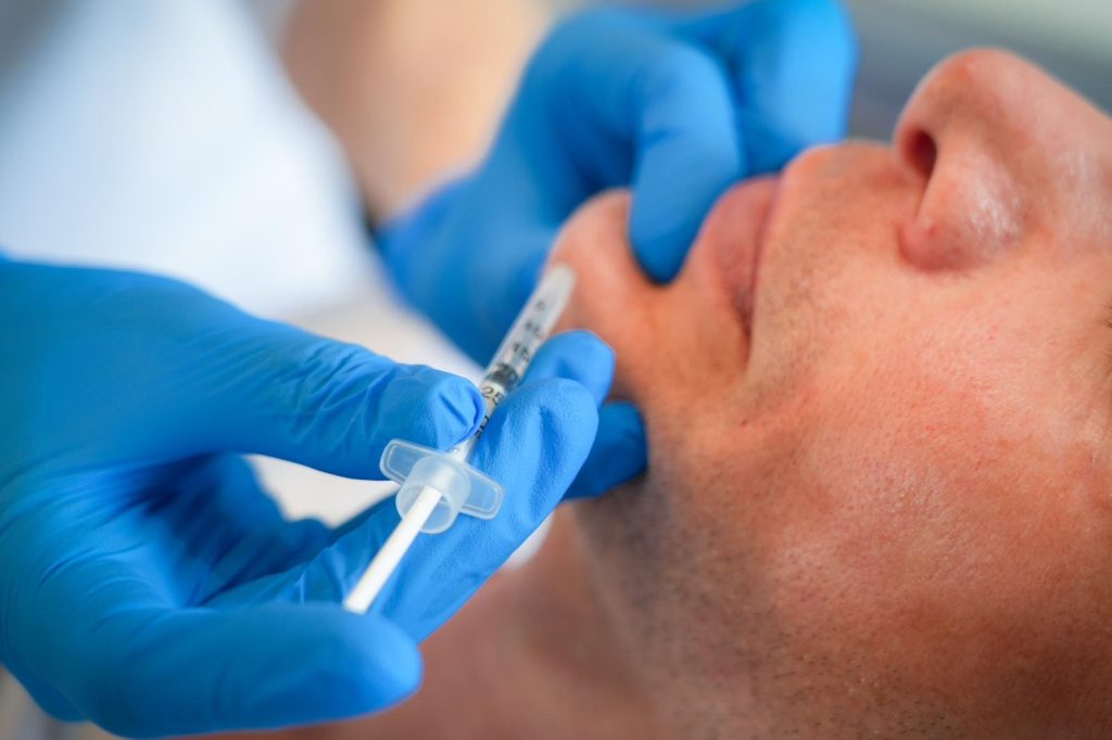 Man having anti-wrinkle treatment in chin