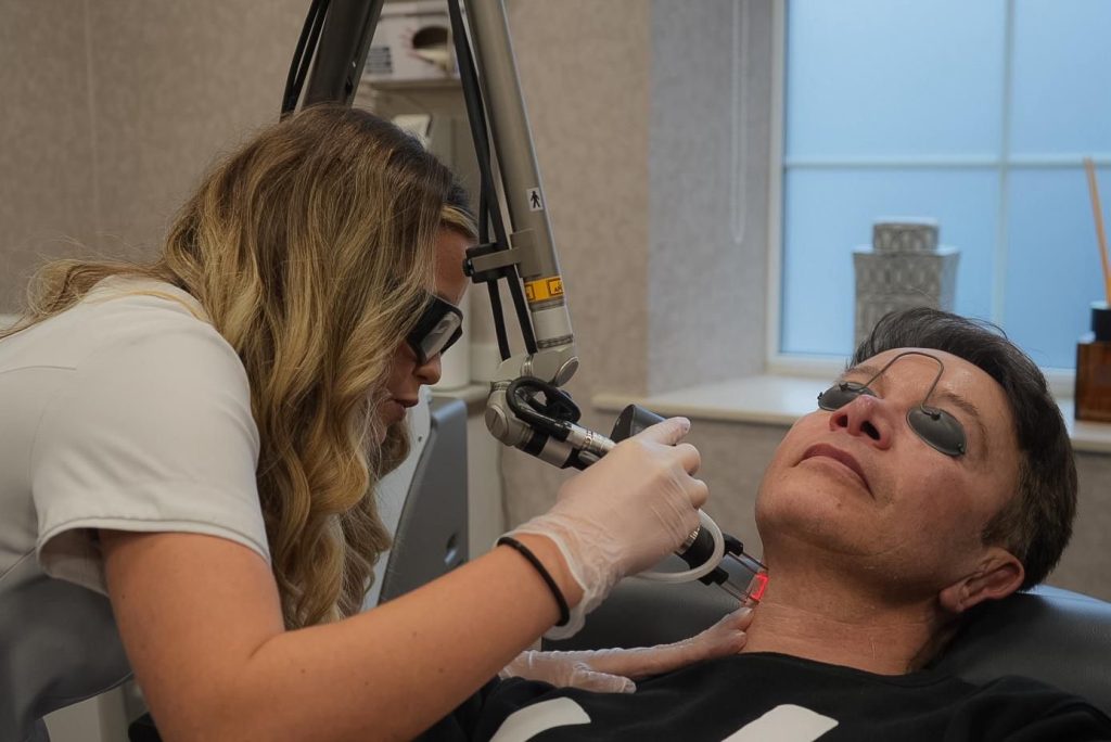 person having co2 resurfacing treatment on neck